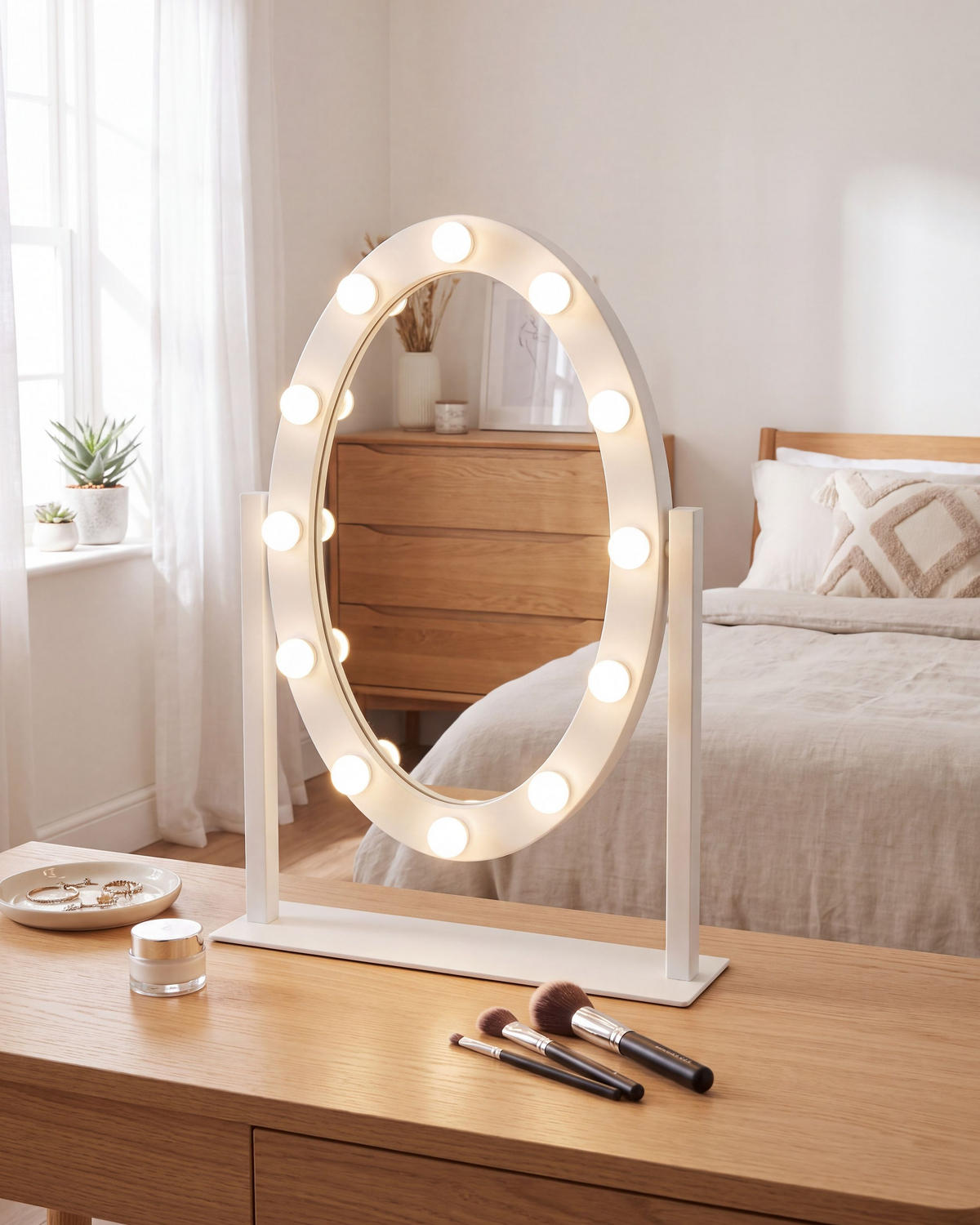 KOUPELNOVÉ ZRCADLO s LED osvětlením oválné 50/60 cm Rostrenen - bílá, kov (55/70/2.5cm) - Beliani