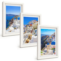 BILDER SET 3er Set - 20x30 cm Weißer Rahmen - Landschaftsarchitektur Oia Santorini - Weiß, Kunststoff (20/30cm) - TULUP