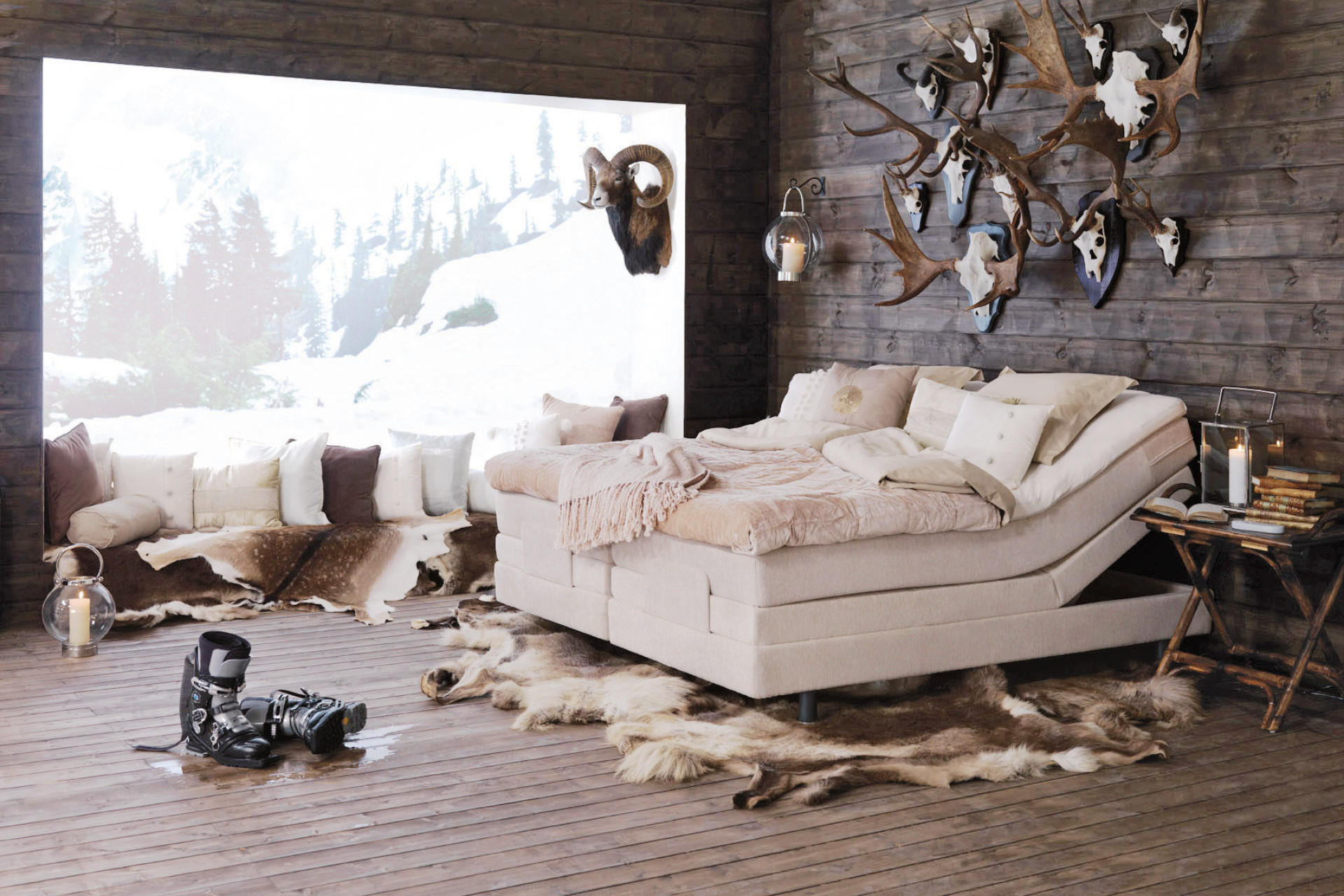 Luxusní postel boxspring v horské chatě