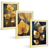 BILDER SET 3er Set - 40x60 cm Goldrahmen - Gelbe Blätter auf dunklem Hintergrund - Goldfarben, Kunststoff (40/60cm) - TULUP