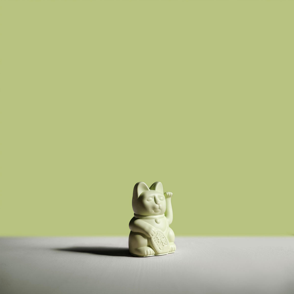 WINKEKATZE Lucky Cat Mini Maneki Neko, Kunststoff, Light Green, 9.8 cm - Grün, Kunststoff (5.2/9.8/6.7cm) - Donkey Products
