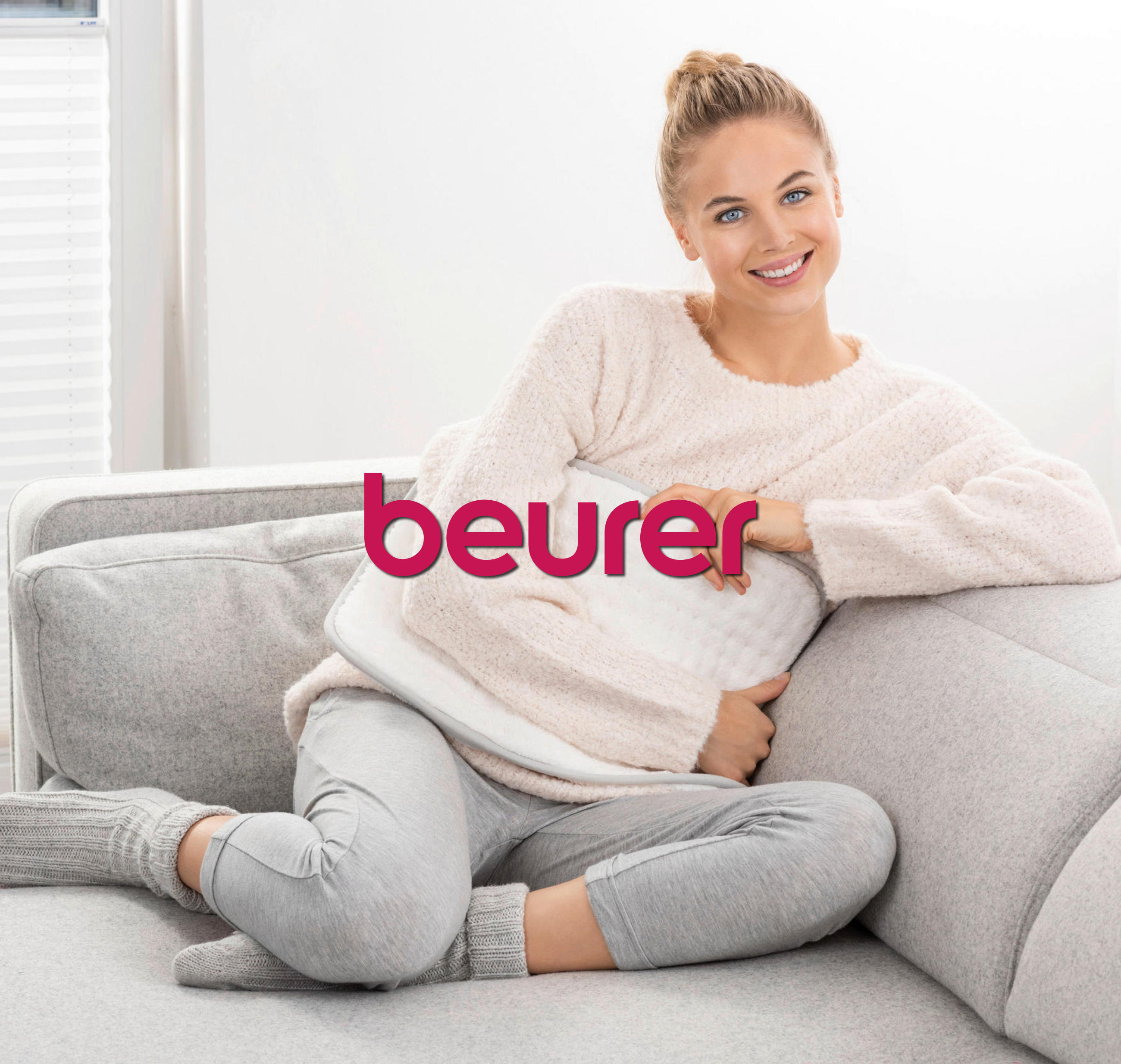 Eine blonde Frau mit einem Lächeln - Beurer