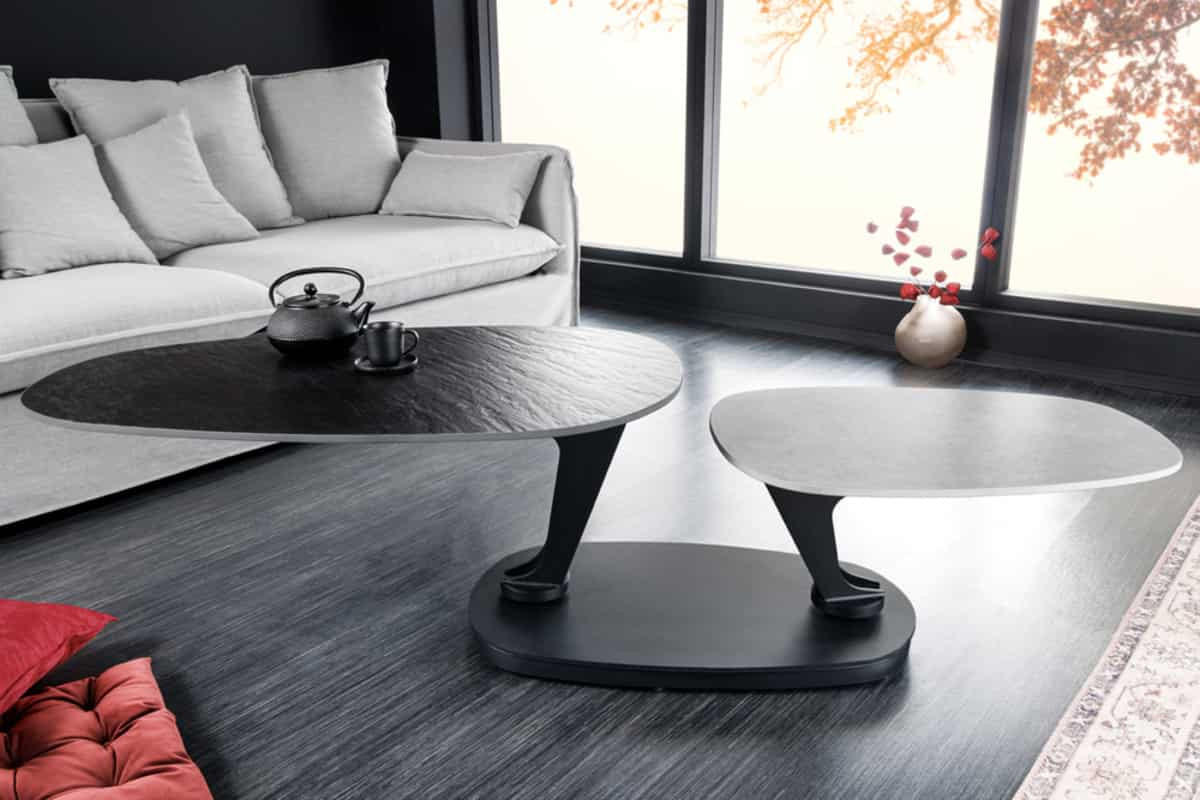 COUCHTISCH MOVEMENT Beton rund Grau|Schwarz 160cm - Goldfarben/Schwarz, Naturmaterialien/Keramik (110/160/40cm) - riess-ambiente