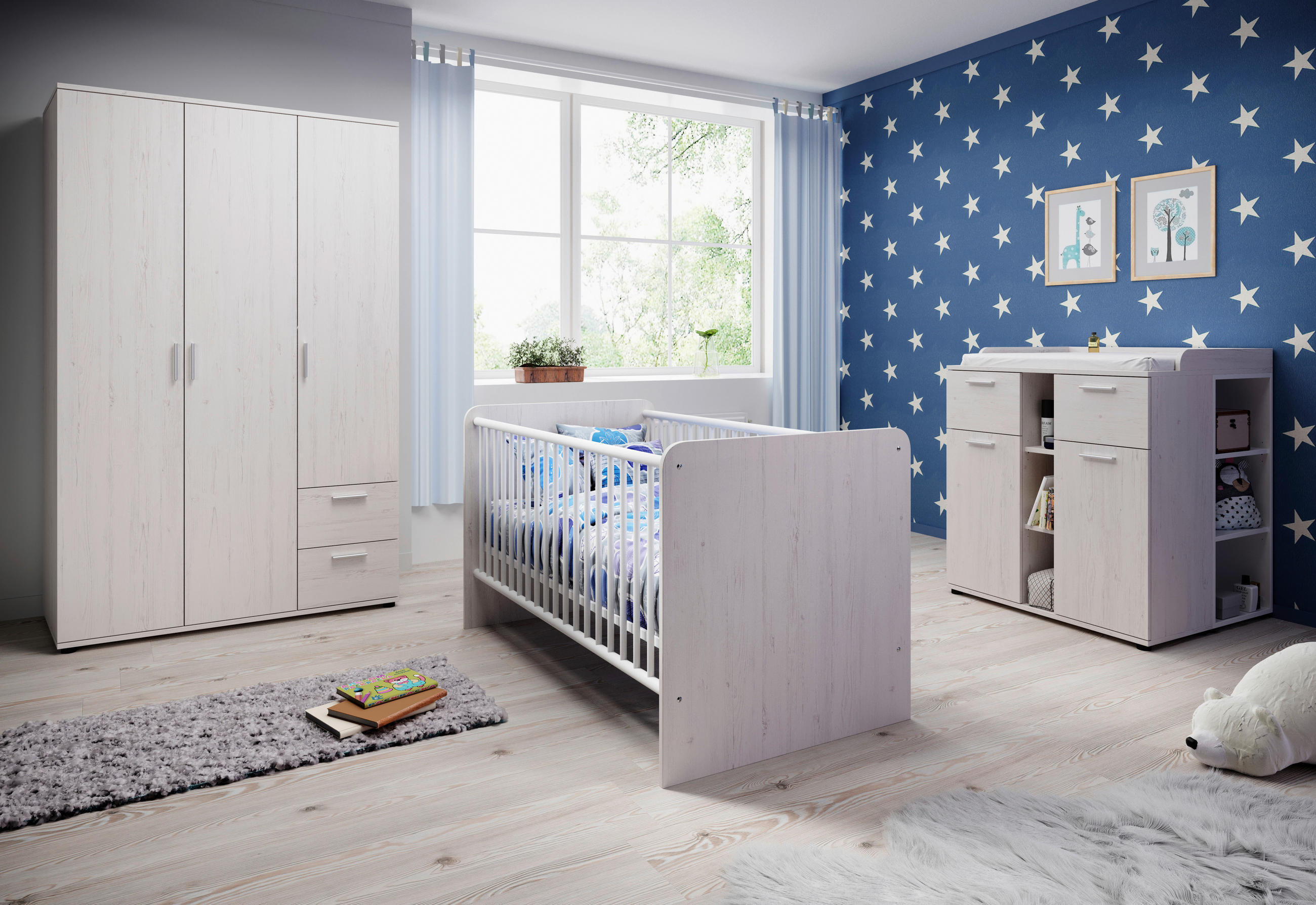 Otroška soba z zvezdastim vzorcem v modri in beli barvi.