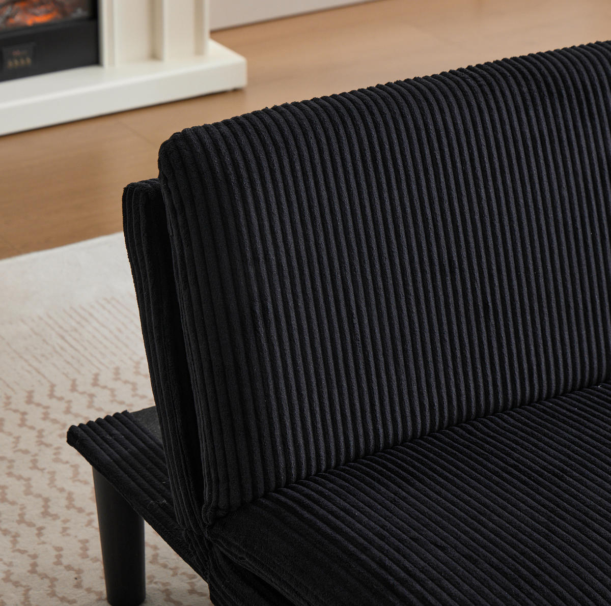 ROZKLÁDACÍ 2místná pohovka ze sametu 168x86x67 cm černá s polohovacím opěradlem a funkcí lůžka - černá, textil (84/67/167cm) - Modfu