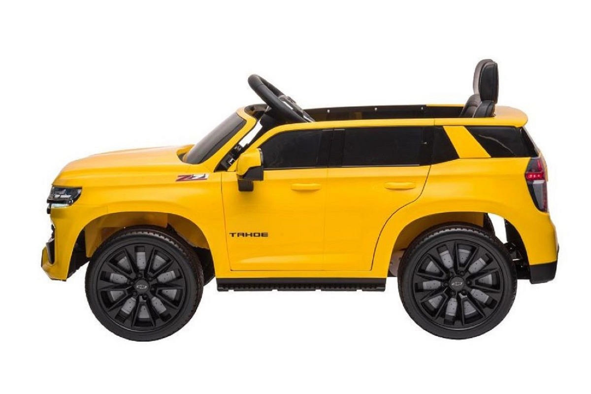 KINDER ELEKTROAUTO Chevrolet Tahoe gelb EVA-Reifen, Kunstledersitz, Stoßdämpfer, Fernbedienung, Musikfunktion - Gelb, Kunststoff (110/67/53cm) - Es-Toys