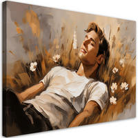 WANDBILD ein mann liegt auf einer wiese - Beige, Textil (60/40cm) - Feeby