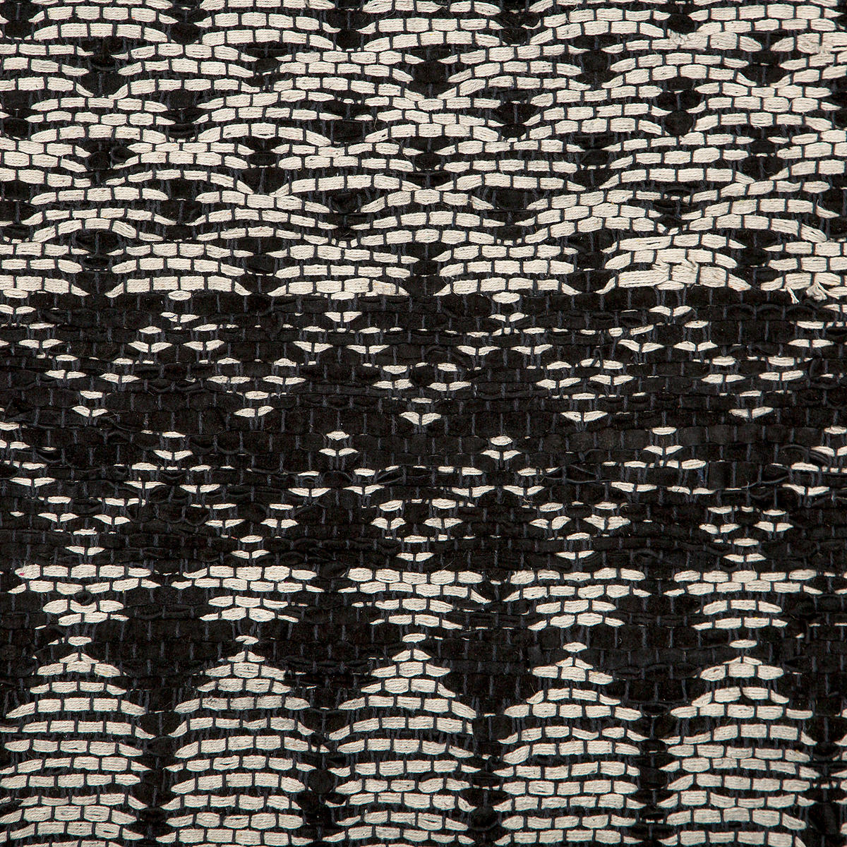 TEPPICH geflochten Sokun 200/140 cm - Schwarz, Fell (140/200cm) - Beliani