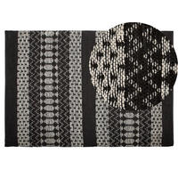 TEPPICH geflochten Sokun 200/140 cm - Schwarz, Fell (140/200cm) - Beliani
