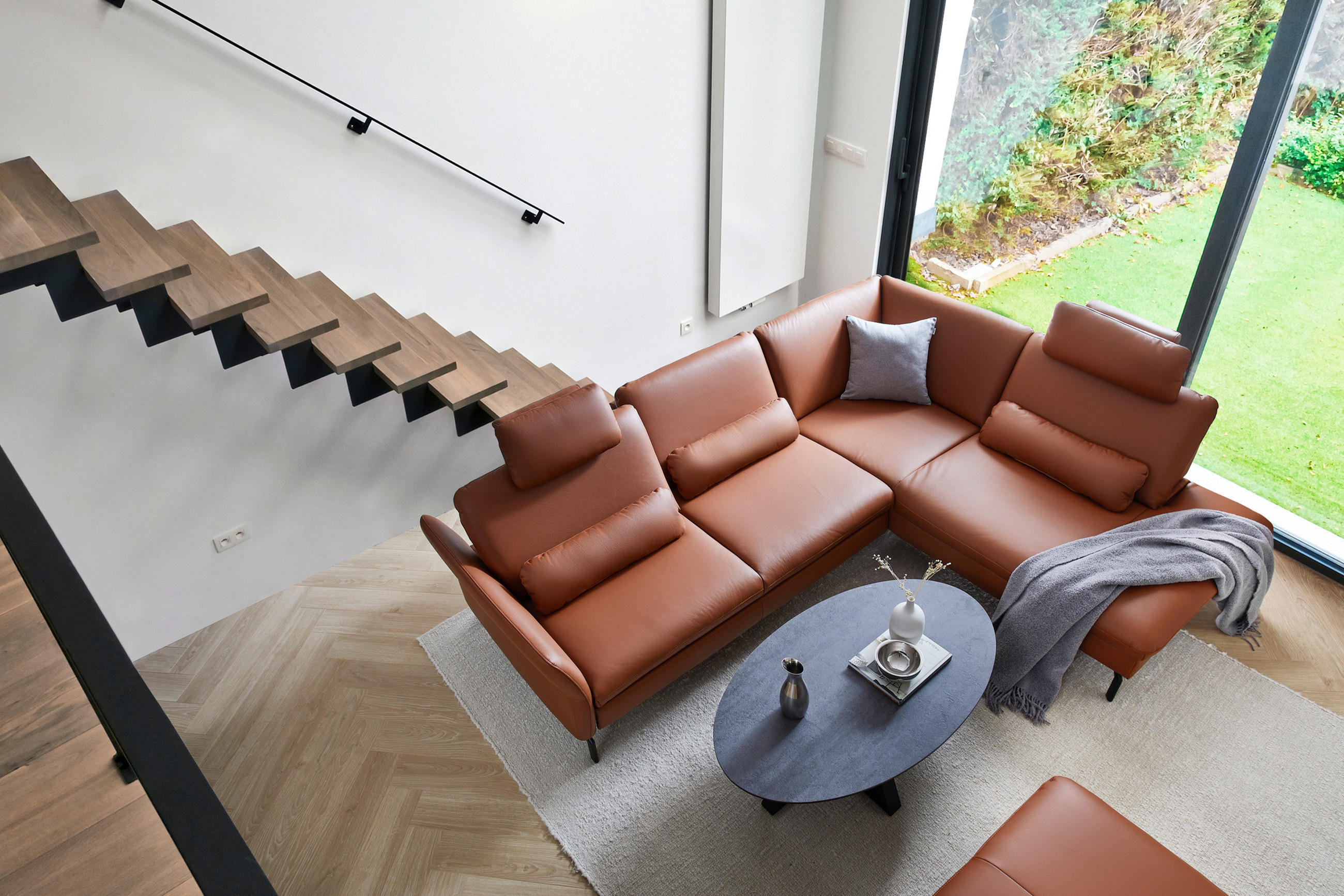 Ledercouch in rot-braun Beldomo