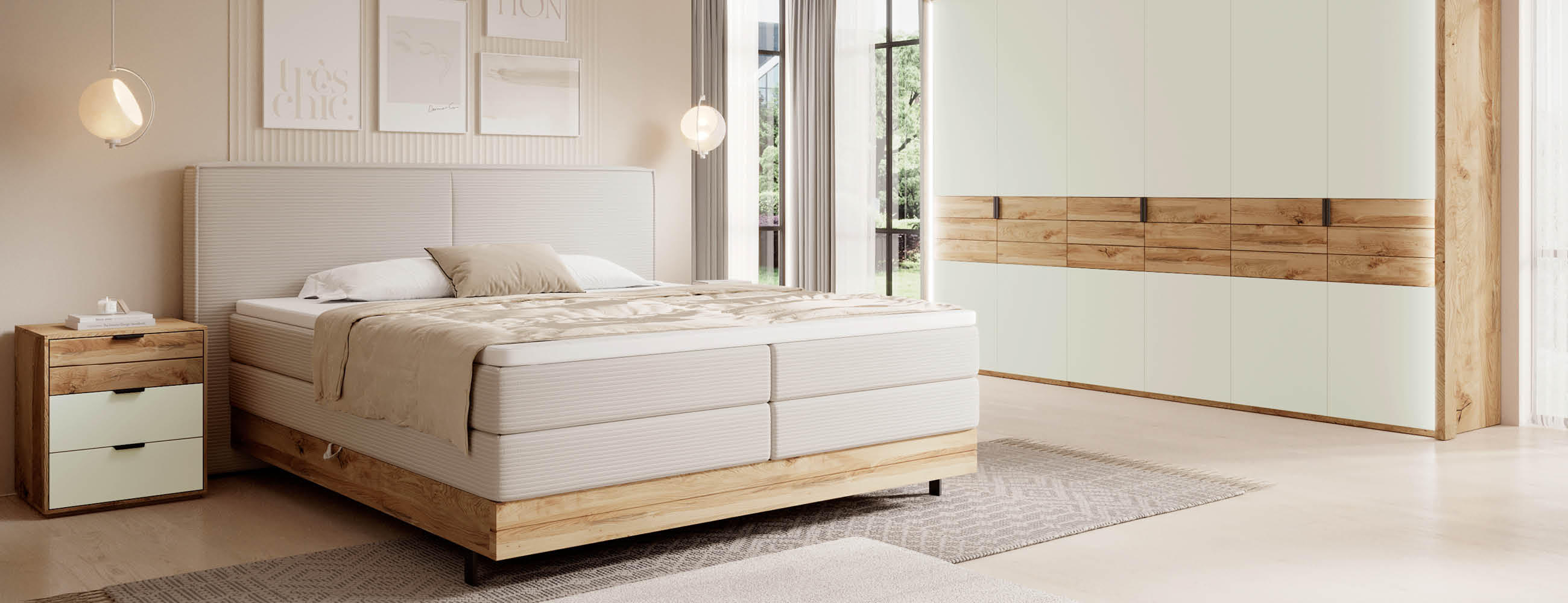 Ein helles Schlafzimmer mit einem Bett, einem Kleiderschrank und einem Nachttisch.