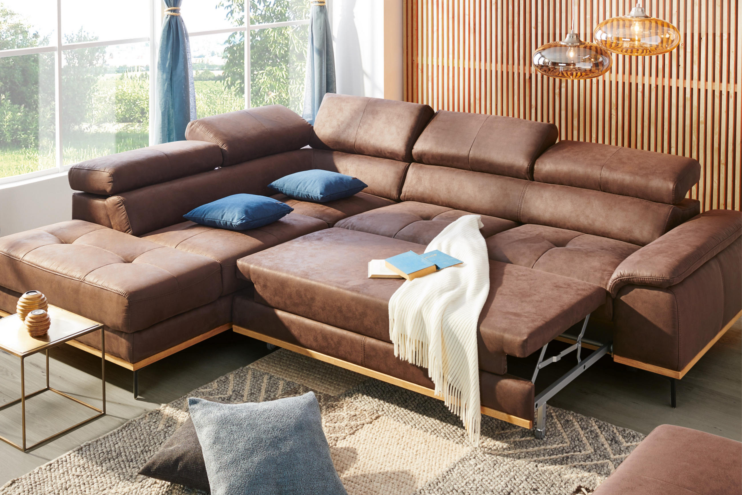 Graues Funktionssofa mit Bettfunktion 