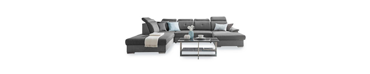 Graues Ecksofa von Cantus mit einem Couchtisch in einem modernen Wohnraum.