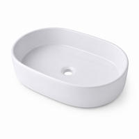 UMIVALNIK Bel keramičen ovalen brez luknje za armaturo - bela, keramika (55/14.5/34cm) - Relaxdays