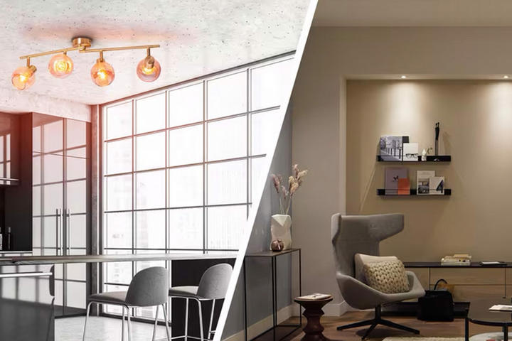 Bild mit moderner Küche und grauen Stühlen auf der linken Seite sowie gemütlichem Wohnbereich mit Regal und Sessel auf der rechten Seite