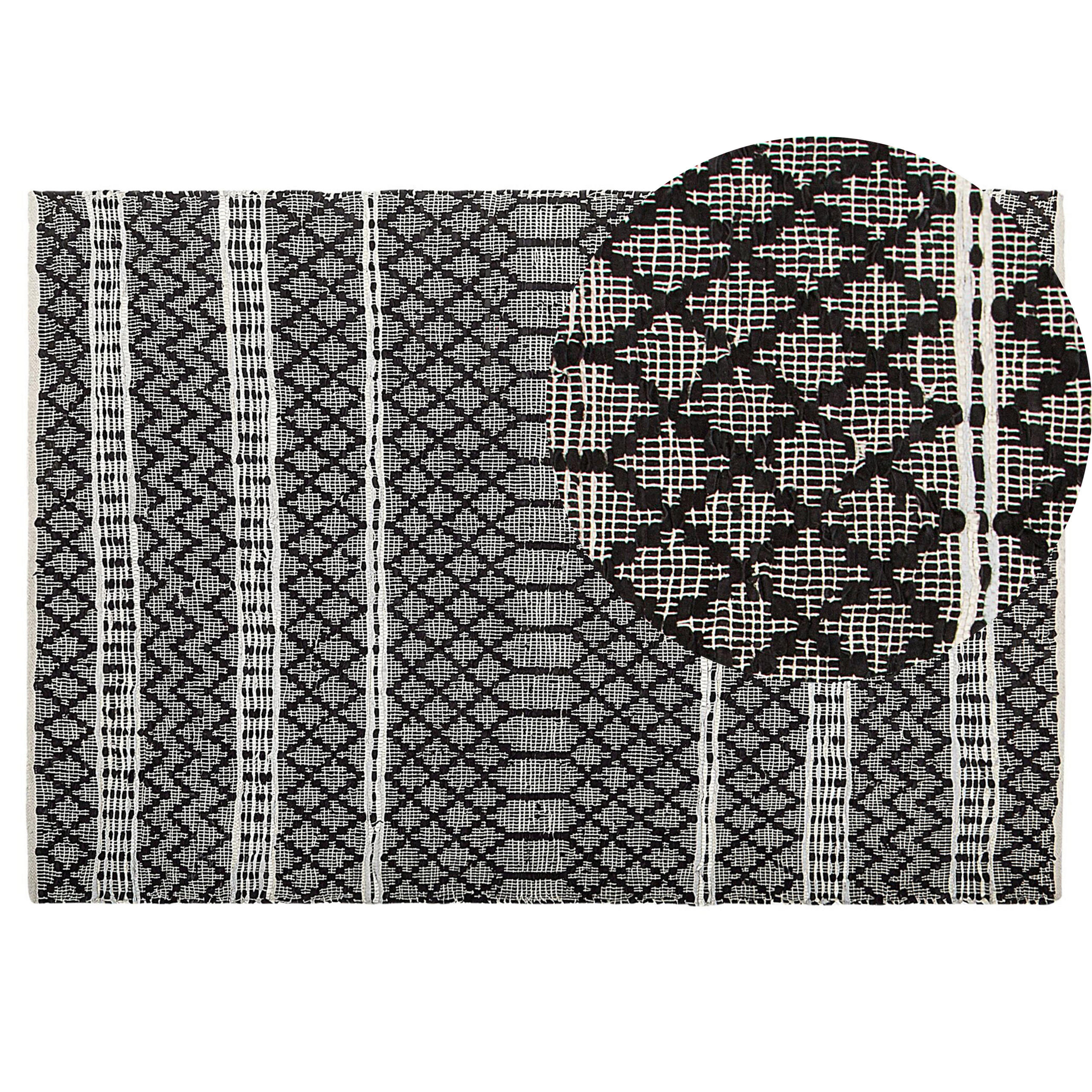 TEPPICH geflochten Fehimli 200/140 cm - Schwarz, Fell (140/200cm) - Beliani