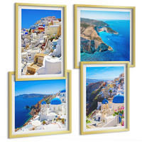 BILDER SET 4er Set - 50x50 cm & 40x60 cm Goldrahmen - Architekturlandschaft Oia Santorin Griechenland - Goldfarben, Kunststoff (50/50cm) - TULUP