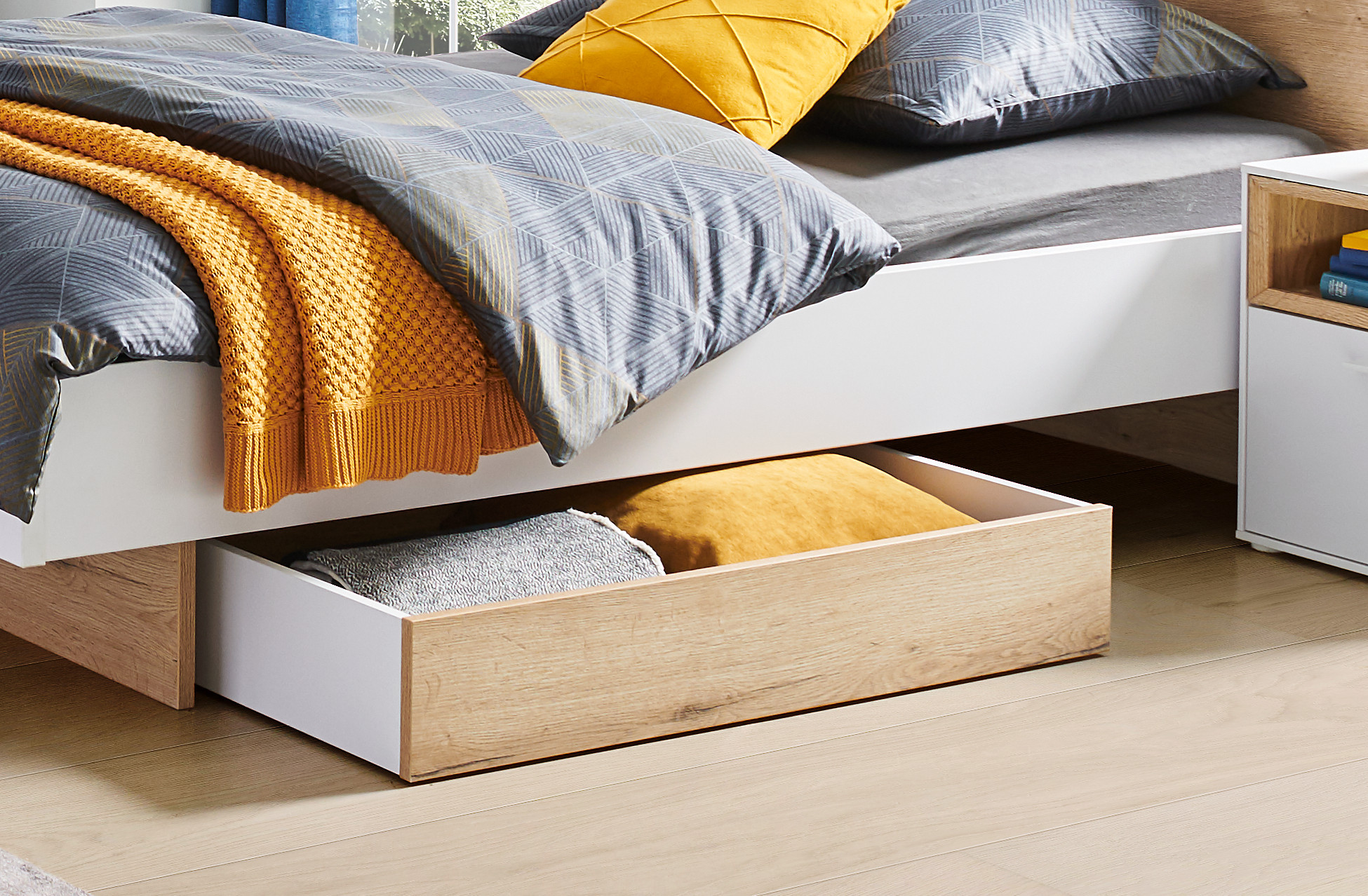 Úložné prostory k postelím