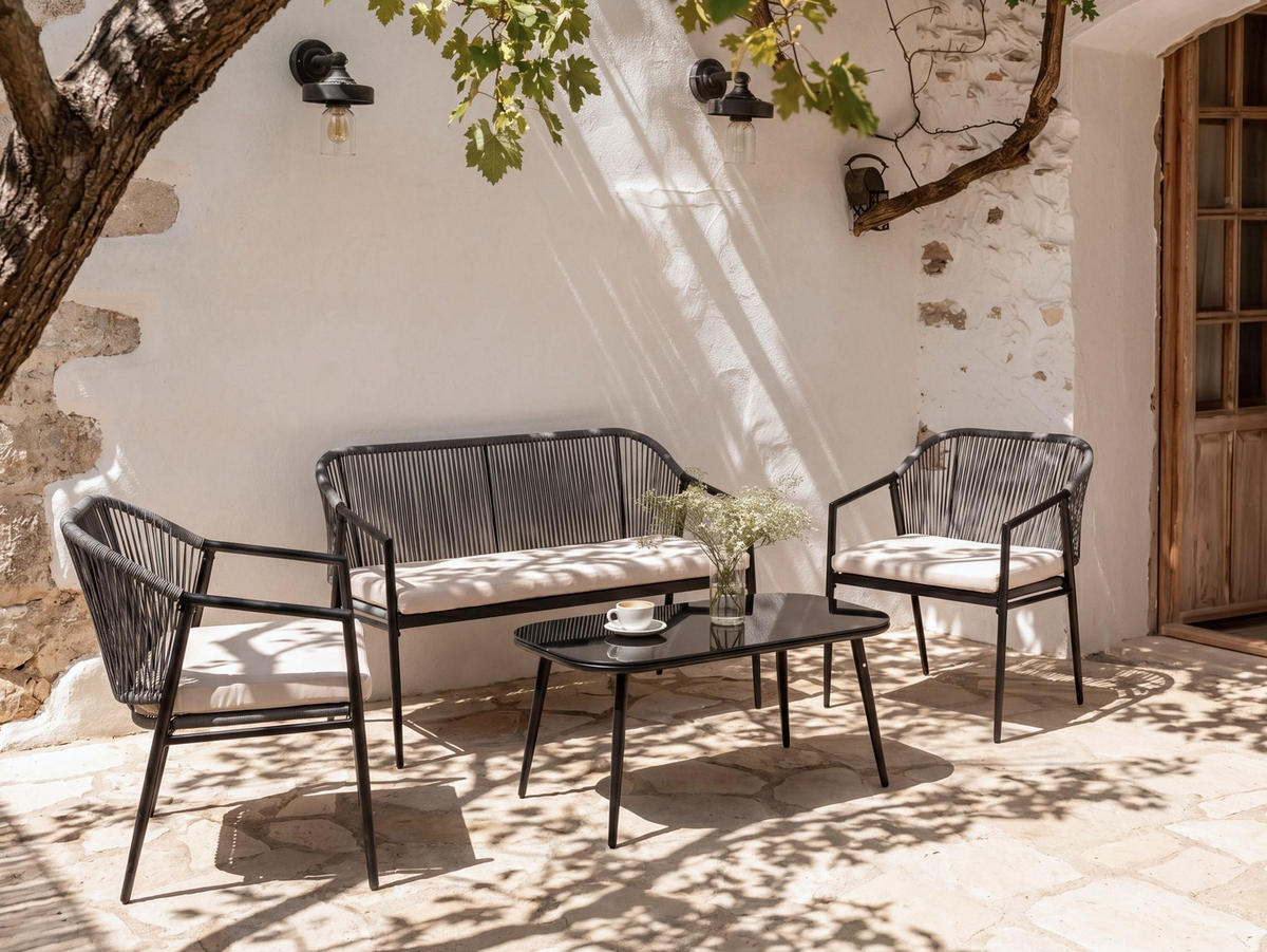 LOUNGE SADA se stolem 4-místná Polyratan Černá Flero - černá/tmavě šedá, plast - Beliani
