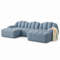 MODULARES Ecksofa mit 3 Sitzplätzen aus granuliertem Fleece in Blau 288x165x79 cm mit 2 Ottomanen - Blau, Textil (165/288cm) - IVMEU