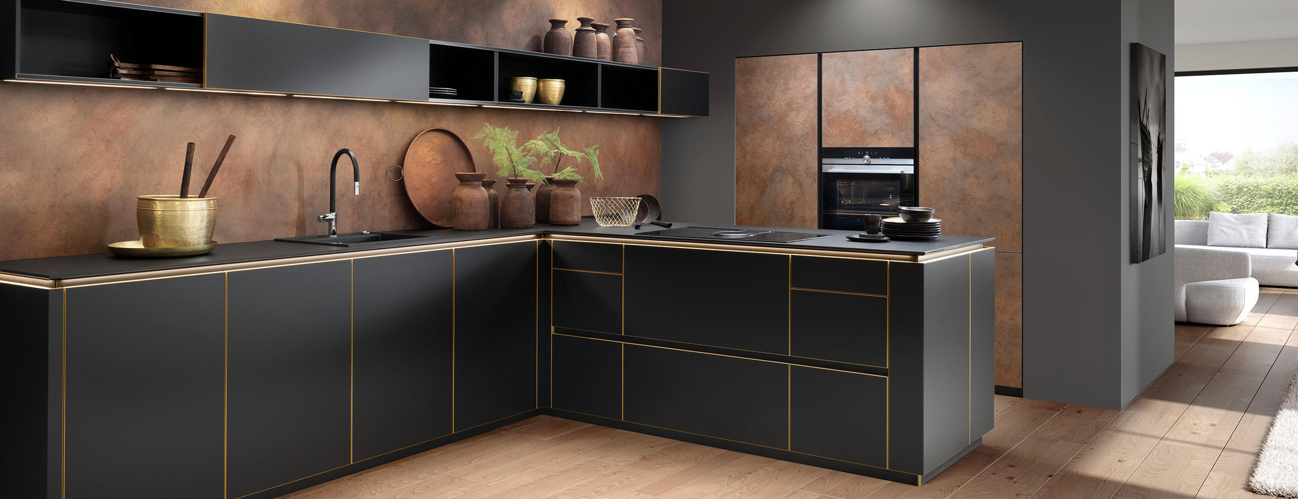 Schwarze Design-Küche in L-Form mit ausgefallen und hochwertigen Materialien.