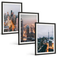 BILDER SET 3er Set - 40x60 cm Schwarzer Rahmen - Städte bei Nacht, Wolkenkratzer, Lichter - Schwarz, Kunststoff (40/60cm) - TULUP