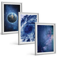 BILDER SET 3er Set - 40x60 cm Silberner Rahmen - Erde Weltraumsturm Galaxie - Silberfarben, Kunststoff (40/60cm) - TULUP