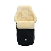 LAMMFELL-FUSSSACK Dublas 2.0, black - Schwarz, Fell (45/95cm) - Kaiserbaby