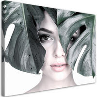 LEINWANDBILD Porträt einer Frau und Monstera-Blättern 100x70cm - Grau, Textil (100/70cm) - Feeby