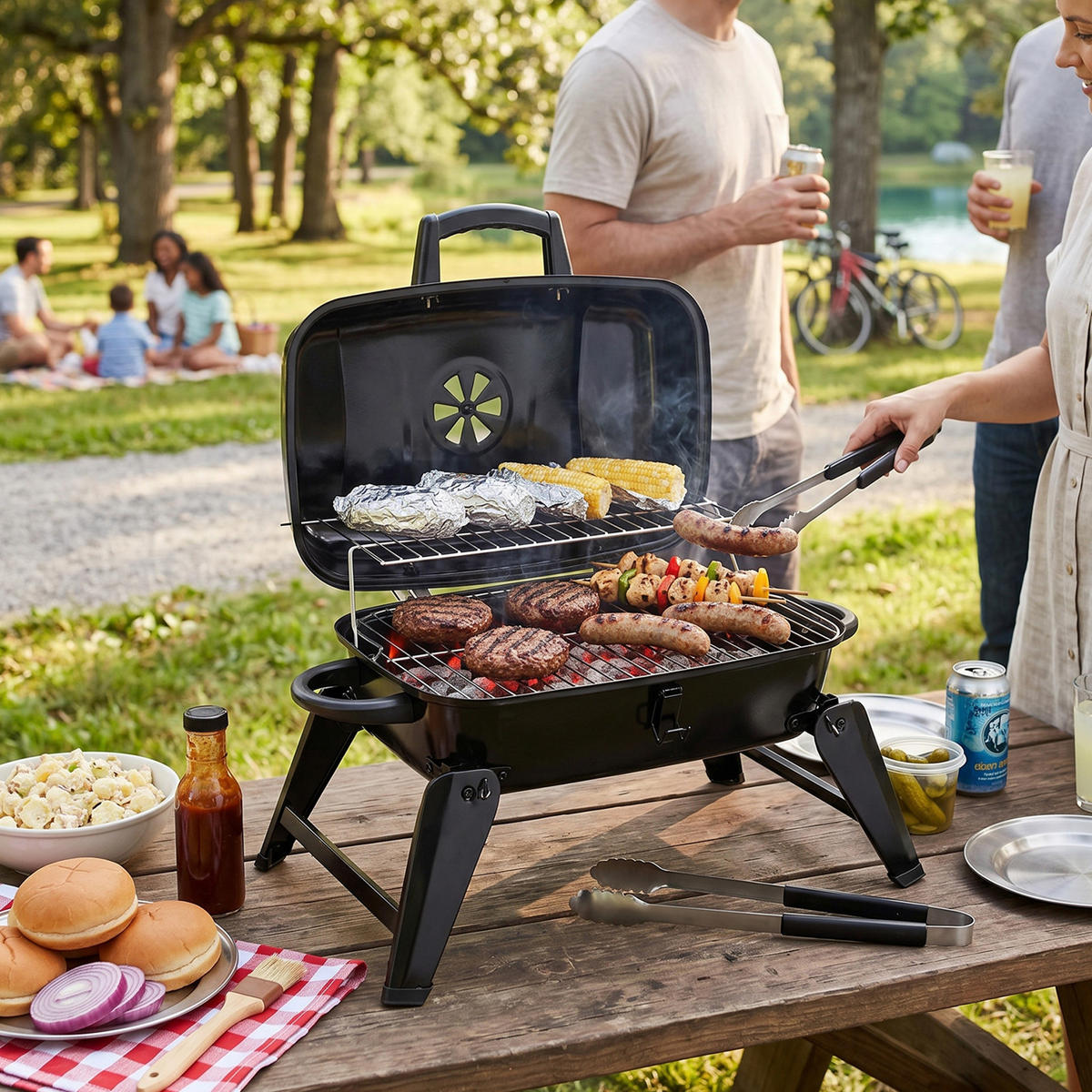 HOLZKOHLEGRILL aus Kohlenstoffstahl in Schwarz für die Terrasse Tragbarer 68 cm B x 34 cm T x 36 cm H - Schwarz, Metall (68/36/34cm) - Livingandhome
