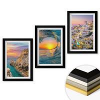 WANDBILDER 3er-Set - 20x30 cm Schwarzer Rahmen - Meereswellen, weiße Häuser, Santorini - Schwarz, Kunststoff (20/30cm) - ArtPrintCave