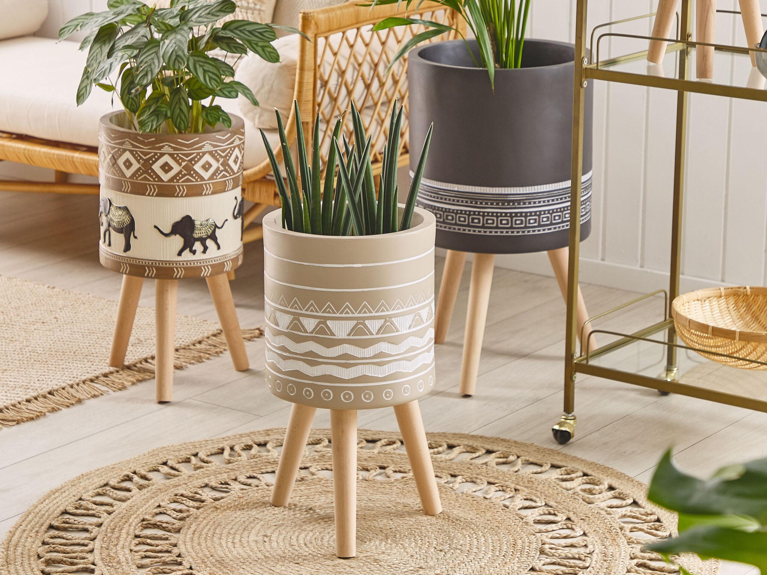 PFLANZENSTÄNDER beige mit Holzbeinen 55 cm Milina - Hellbraun/Beige, Stein (55cm) - Beliani