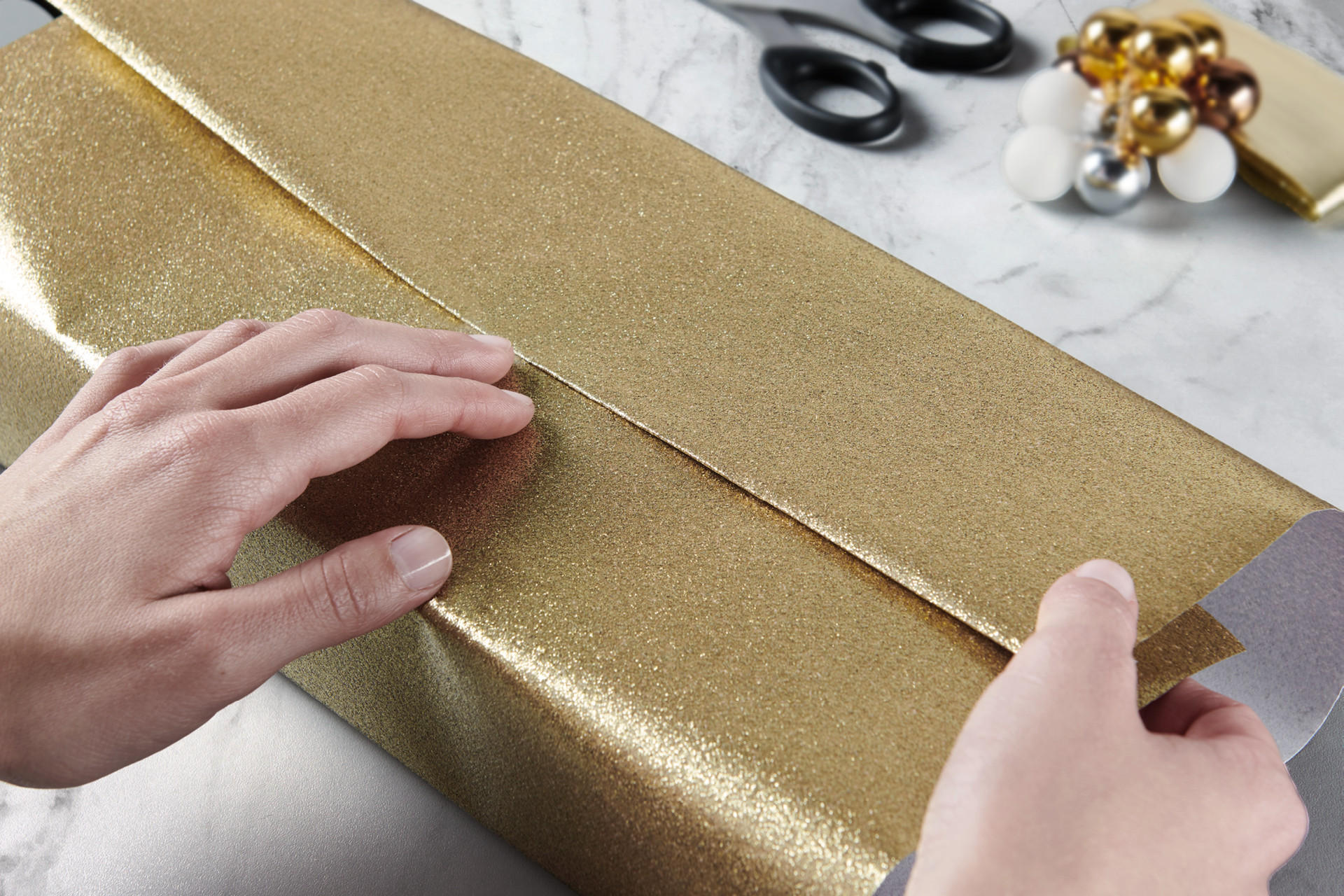 Geschenkspapier in Gold