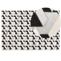 PATCHWORK-TEPPICH Narman 200/140 cm - Schwarz, Fell (140/200cm) - Beliani