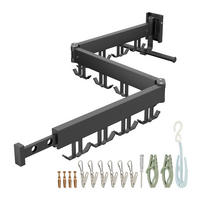 STOJAN na bielizeň na stene - čierna, kov/plast (127/12/26cm) - Relaxdays