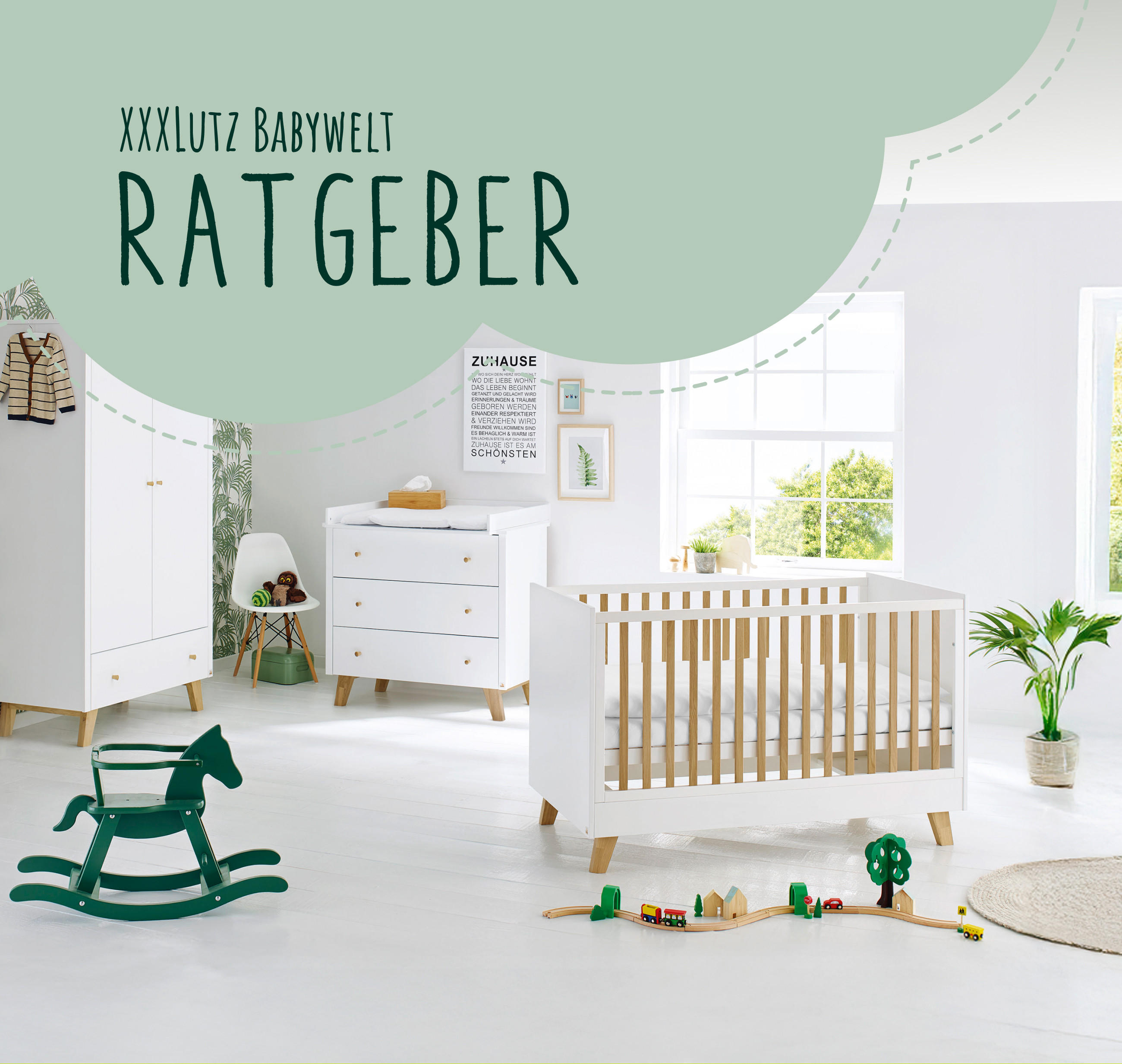 Modern eingerichtetes Babyzimmer mit weißem Gitterbett, Kommode, grüner Wippe und Wanddekorationv