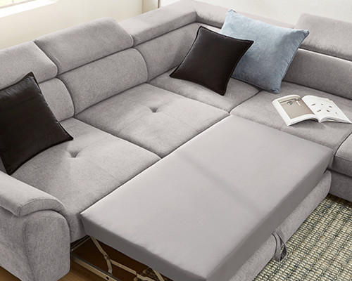 Graues Sofa mit Ausziehfunktion