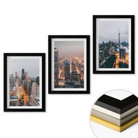 WANDBILDER 3er-Set - 20x30 cm Schwarzer Rahmen - Städte bei Nacht, Wolkenkratzer, Lichter - Schwarz, Kunststoff (20/30cm) - ArtPrintCave