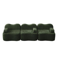 3-SITZER-SOFA aus Samt Grün mit tiefer Sitzfläche, Wellenform und flexiblem Hocker - Grün, Textil (288/70/98cm) - Modfu
