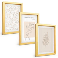 BILDER SET 3er Set - 20x30 cm Goldrahmen - Minimalistische botanische Motive - Goldfarben, Kunststoff (20/30cm) - TULUP