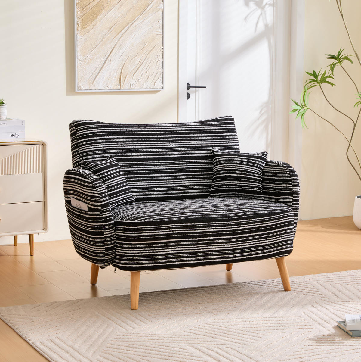 DVOUMÍSTNÁ pohovka ze smyčkové tkaniny 121x81,5x87 cm černá s bočními kapsami a pohodlným sedákem - černá, textil (81.5/87/121cm) - Modfu