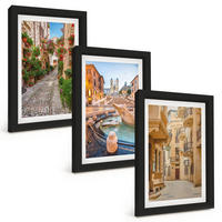 BILDER SET 3er Set - 20x30 cm Schwarzer Rahmen - Die bezaubernden Straßen des Brunnens - Schwarz, Kunststoff (20/30cm) - TULUP