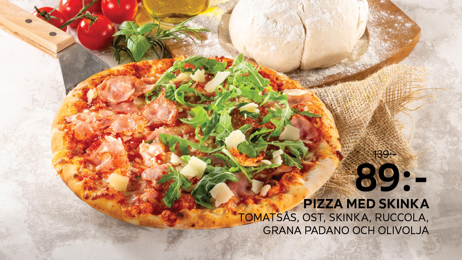 Pizza med skinka Tomatsås, ost, skinka, ruccola, Grana Padano och olivolja