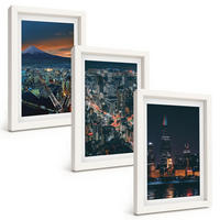 BILDER SET 3er Set - 20x30 cm Weißer Rahmen - Bergpanorama der Stadt bei Nacht - Weiß, Kunststoff (20/30cm) - TULUP