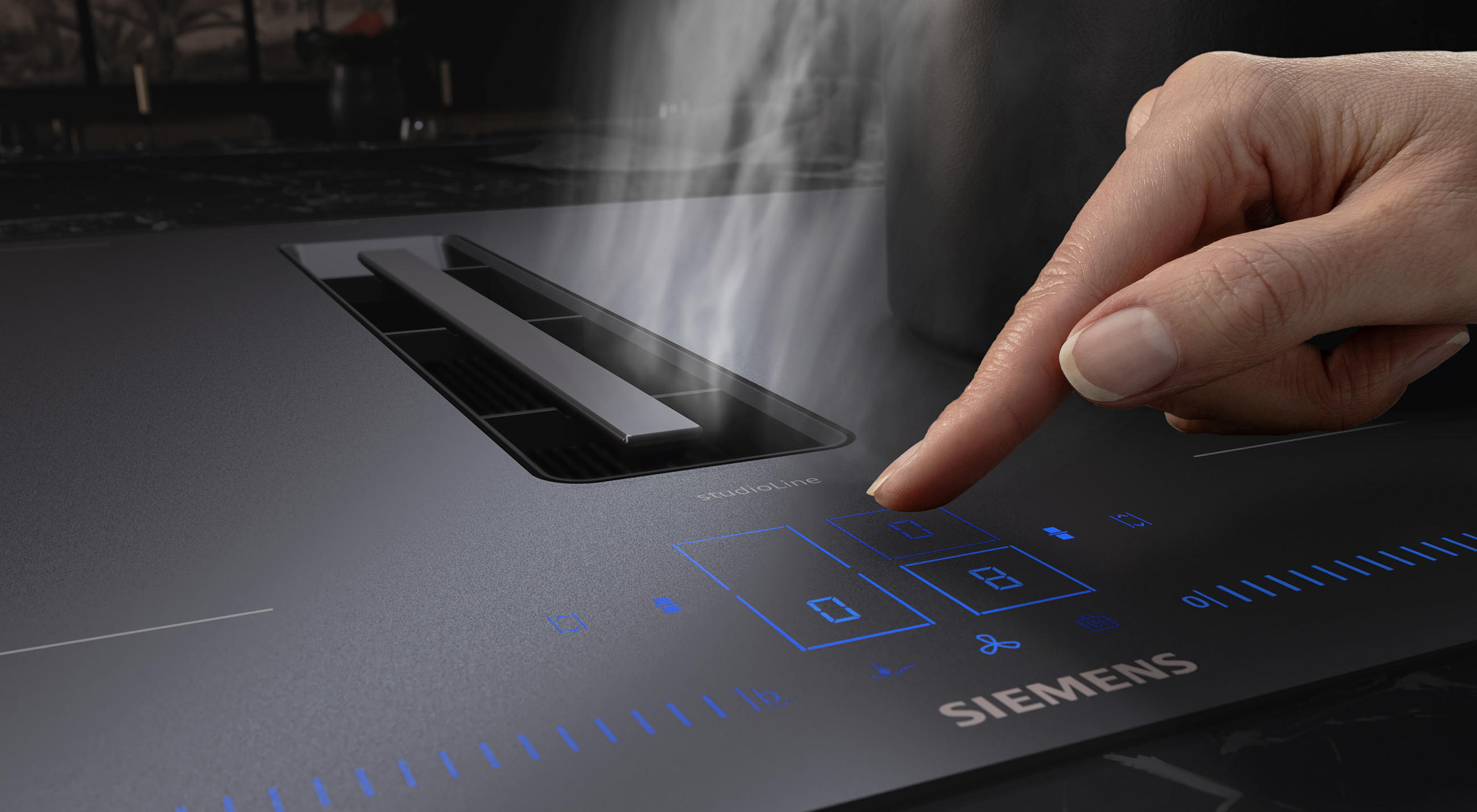 Nahaufnahme von Touch-Bedienung der SIEMENS Induction Air Plus Kochfeld in der Matt Edition.