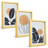 BILDER SET 3er Set - 20x30 cm Goldrahmen - Pflanzenmuster große Sonnen minimalistisch - Goldfarben, Kunststoff (20/30cm) - TULUP