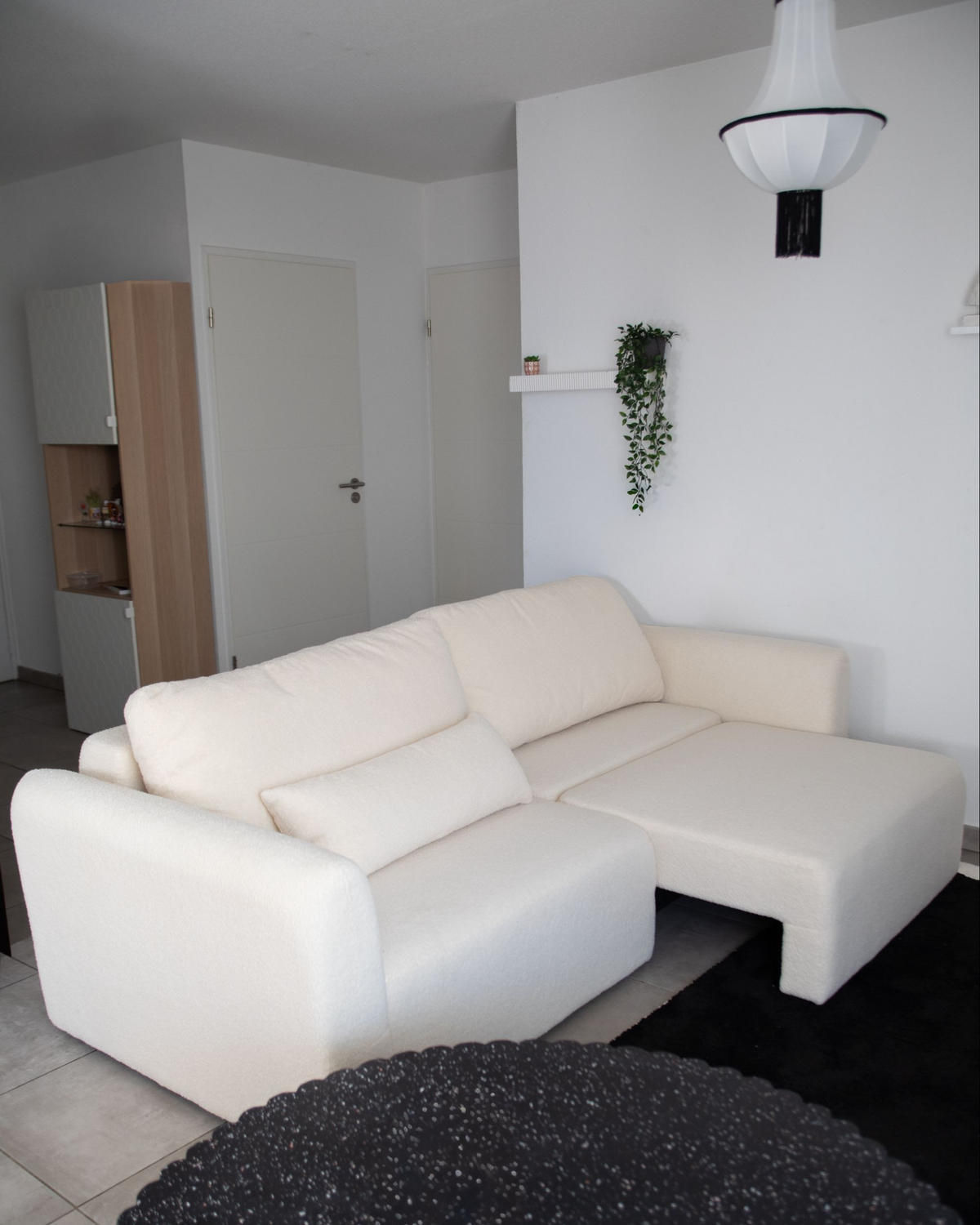 ROZKLÁDACÍ POHOVKA 3-místná Bouclé Krémově bílá s úložným prostorem Vaxholm - krémová, textil (232/86/87cm) - Beliani