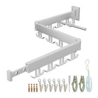 STOJAN na bielizeň na stene - biela, kov/plast (127/12/26cm) - Relaxdays