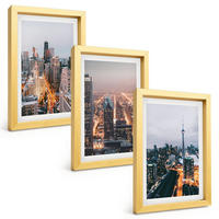 BILDER SET 3er Set - 20x30 cm Goldrahmen - Städte bei Nacht, Wolkenkratzer, Lichter - Goldfarben, Kunststoff (20/30cm) - TULUP