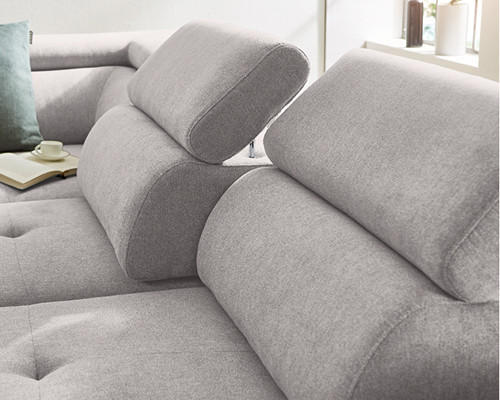 Graues Ecksofa mit Rückenlehnen
